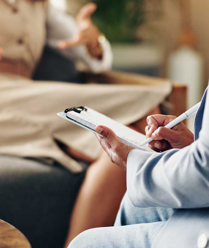 Ketamine-Assisted Psychotherapy Therapist and patient discussing how psychotherapy may complement medically supervised ketamine treatment