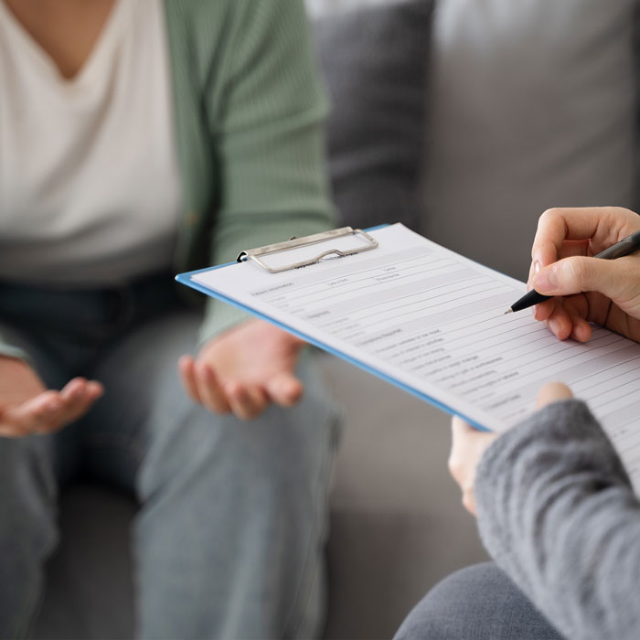 Who May Be Evaluated for Ketamine Treatment Patient speaking with a clinician about treatment-resistant depression and ketamine eligibility